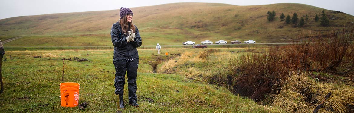 Volunteer at 2019 restoration event. (Photo by Brent Calver)