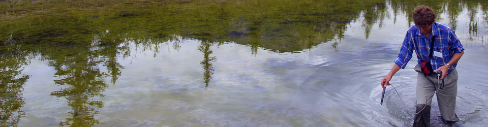 NCC intern takes water samples, Kootenay Rockies, BC (Photo by NCC)